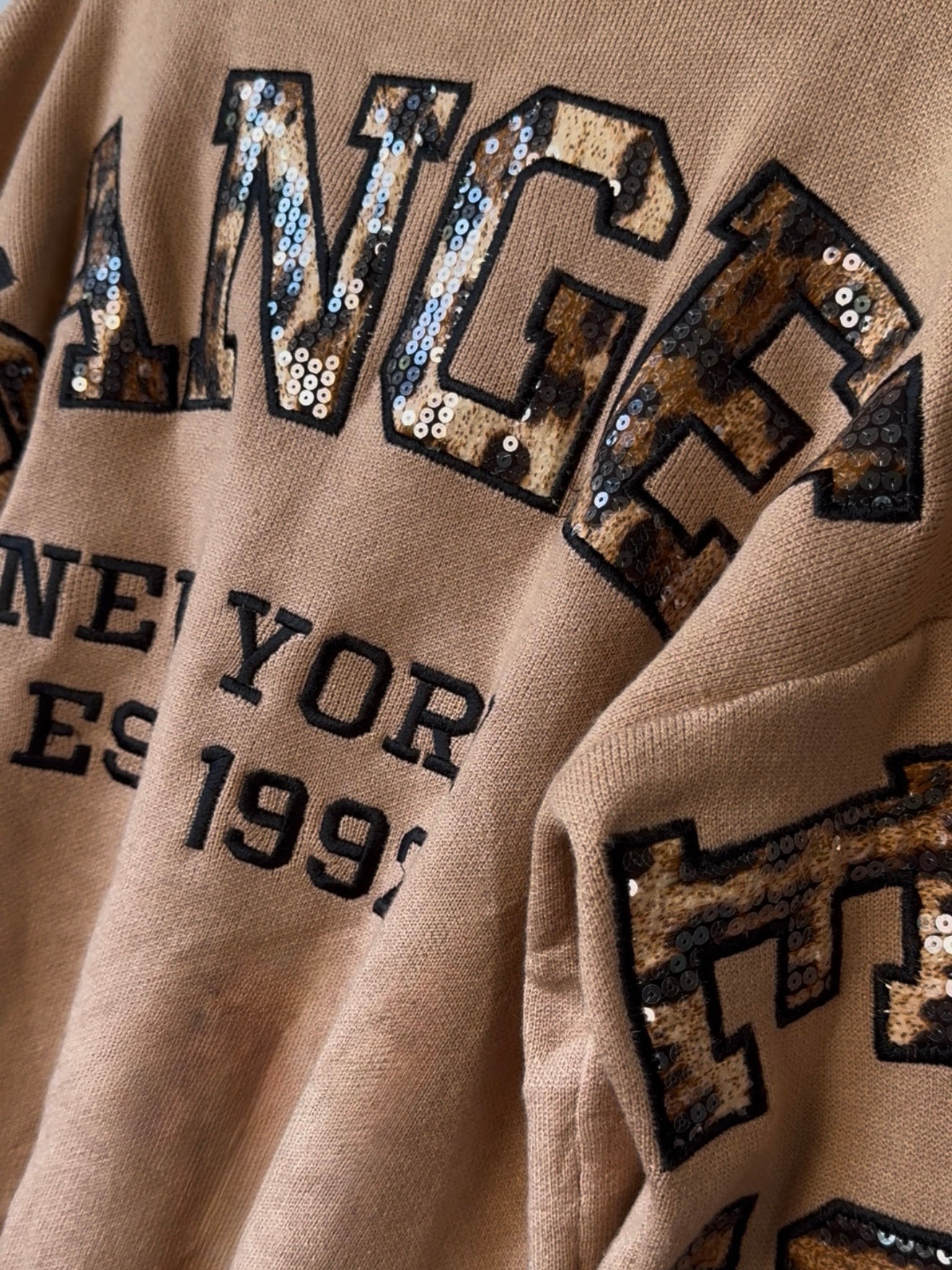 Pullover mit Pailletten, versch. Farben