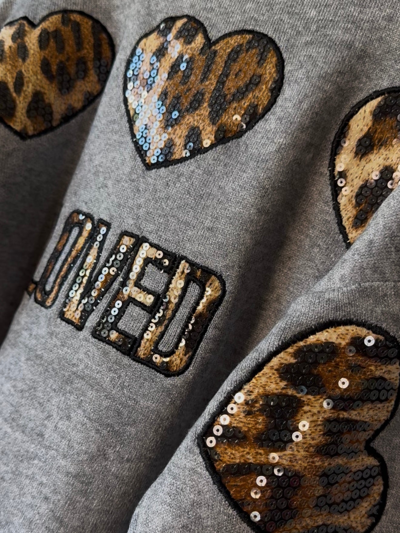 Pullover mit Pailletten, versch. Farben